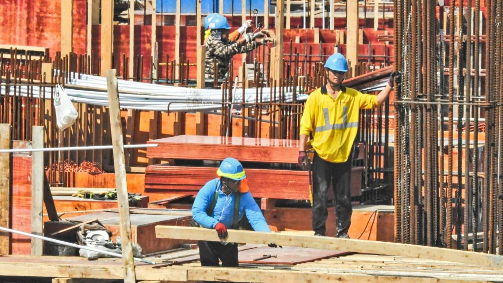 a group of men working on a construction site